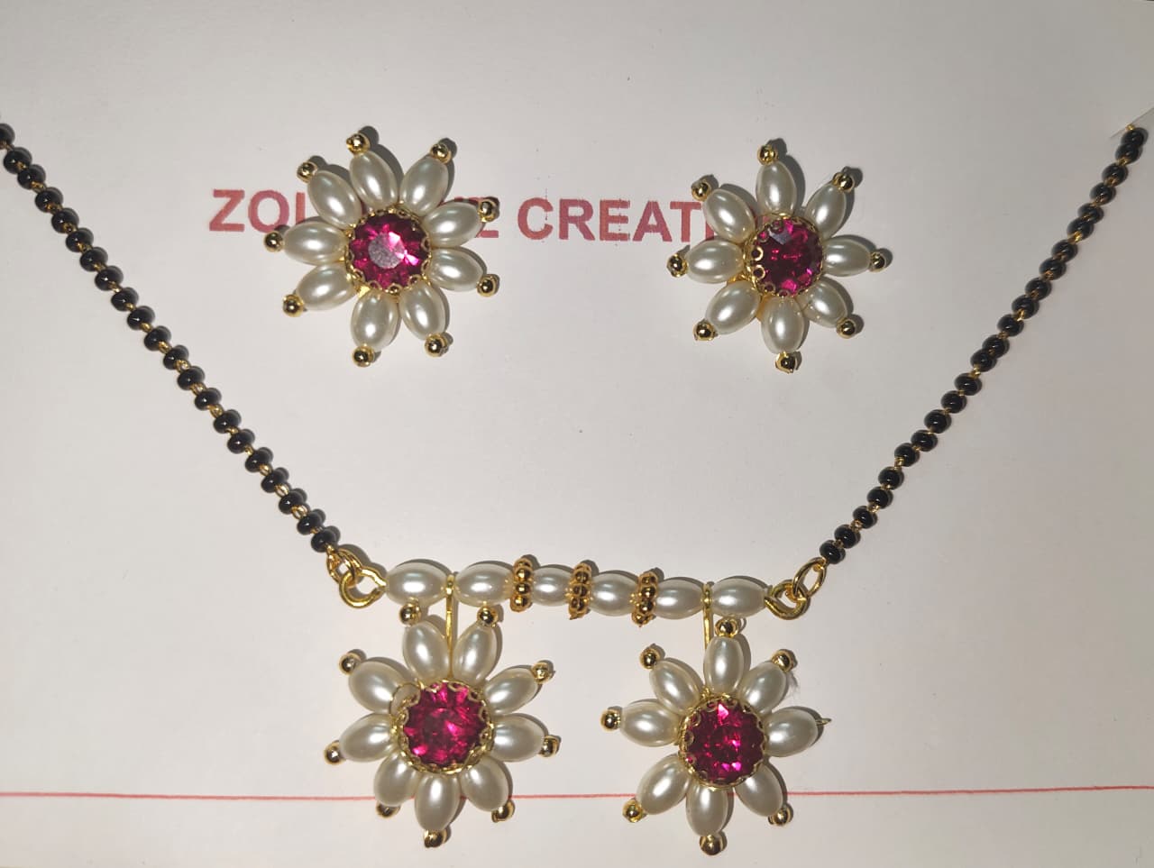 Parijatak mangalsutra (rani)
